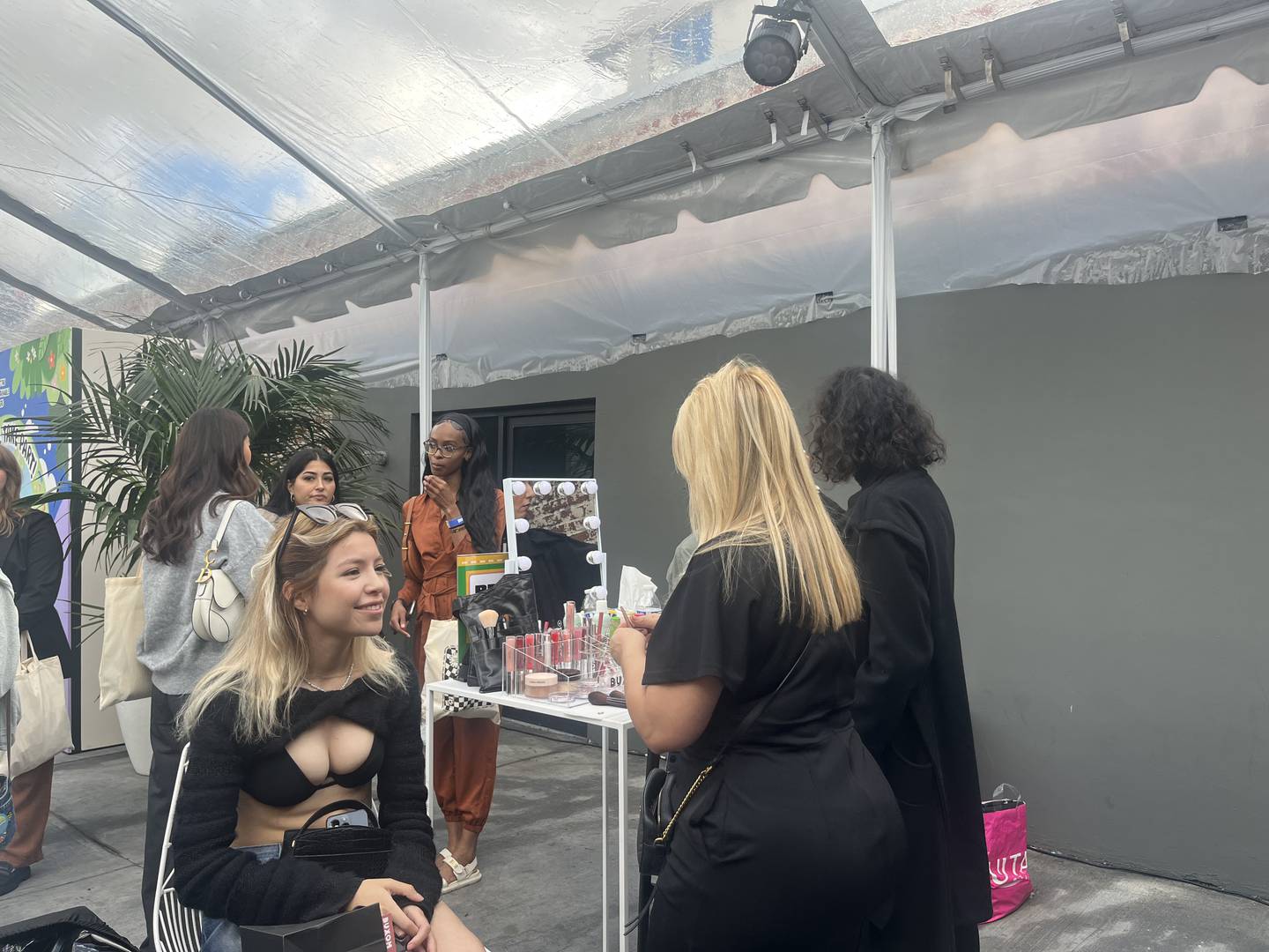 A girl getting her makeup done