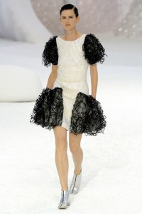 Model Stella Tennant on the runway at Chanel's spring 2012 show at the Grand Palais.