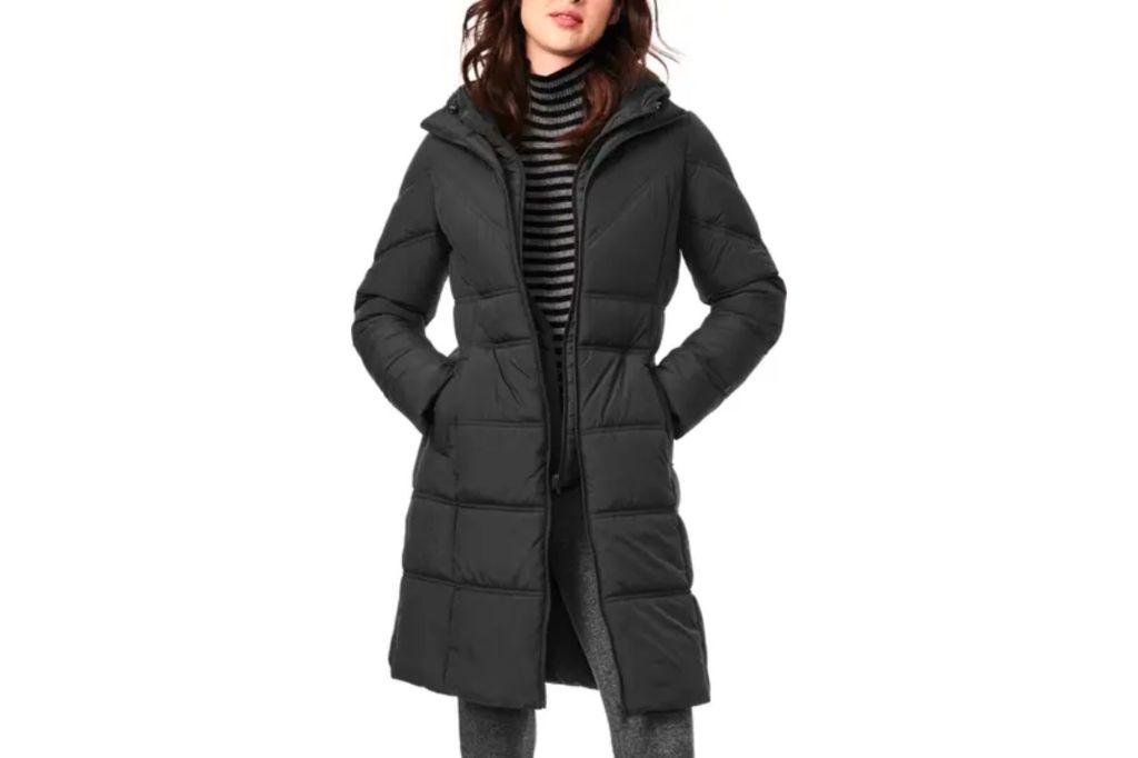 A woman in a puffer coat