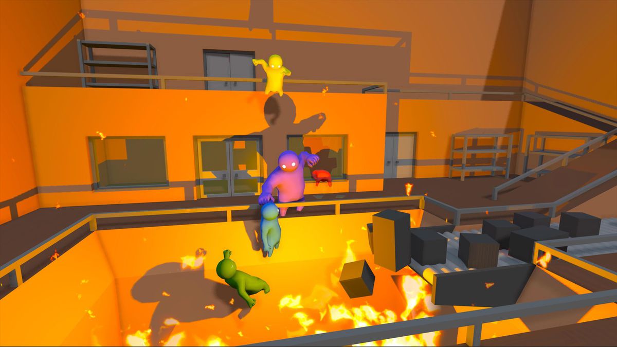 A chaotic image of figures from Gang Beasts jumping around awarehouse that looks partially on fire.