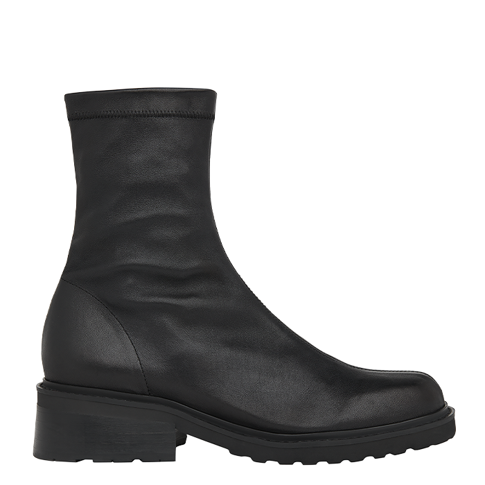 An ankle boot in black, with a thick sole