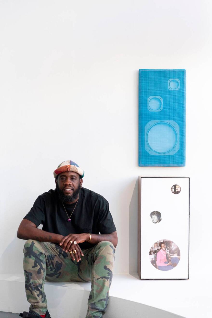 Artist Roscoè B. Thické III with his work “SUBS, MIDS & HIGHS.”