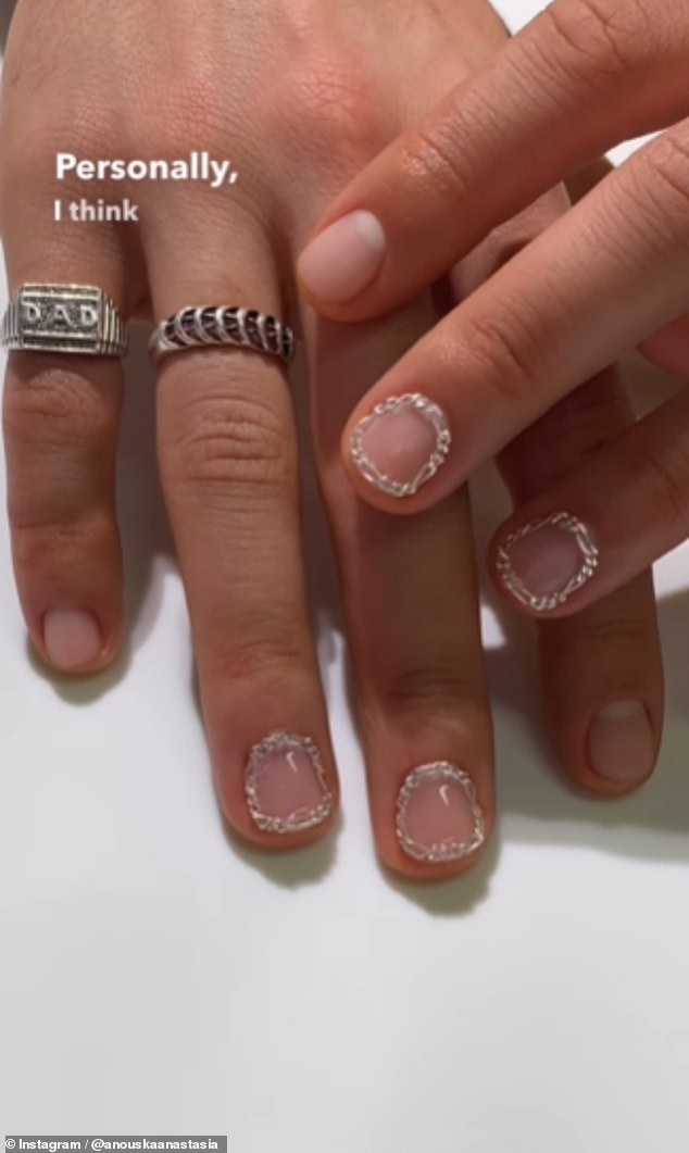 The 'Chained Windows Men's Mani' is a type of nail art which features a silver jewellery chain moulded around a well manicured nail