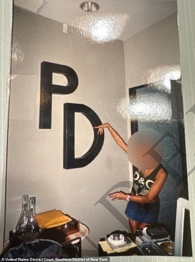 Jane Doe has backed her bombshell claims with a photo of herself goofing around in his Manhattan studio. The letters PD for Puff Daddy are seen on the wall of the studio