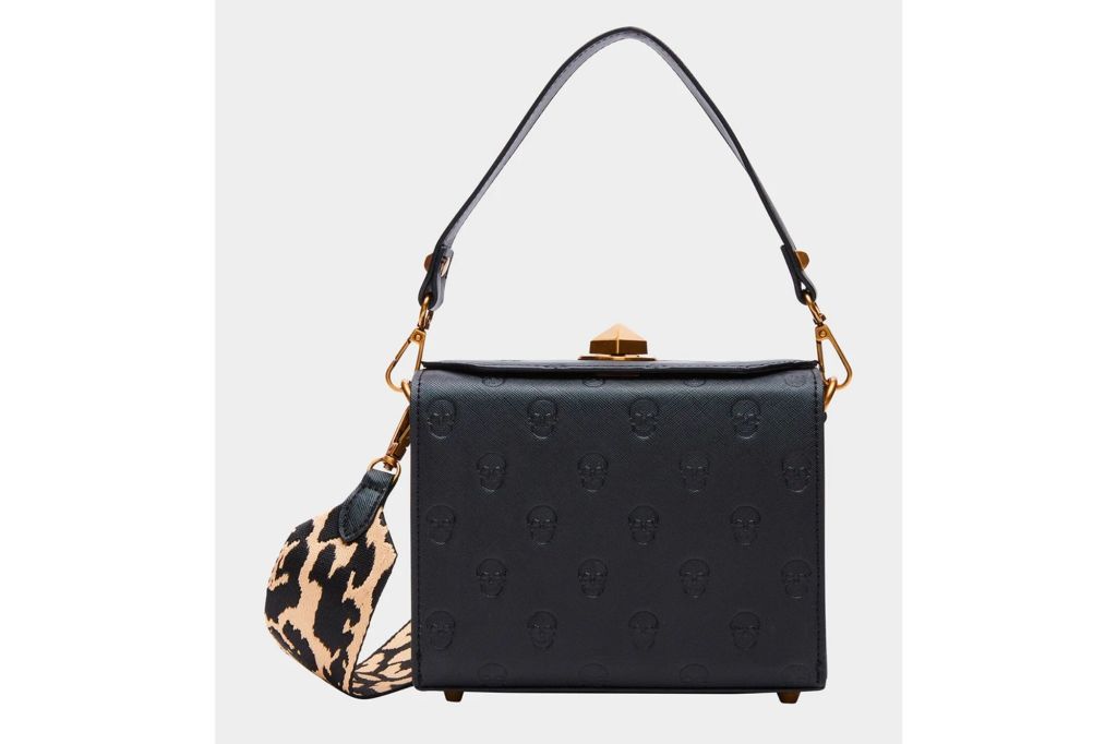 Black box bag with leopard print strap.