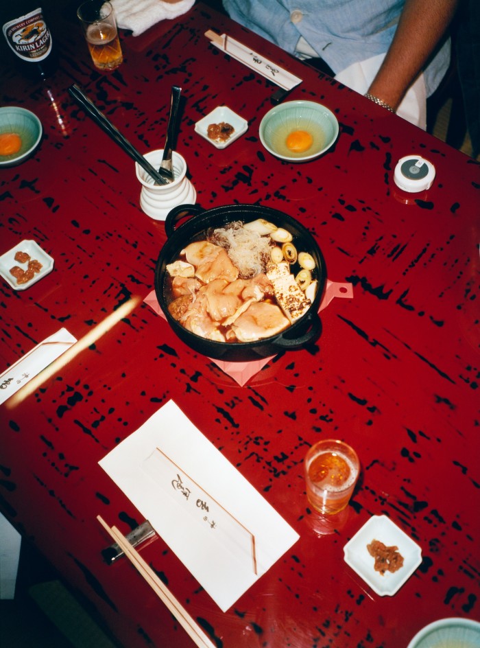 Chicken simmers in the hot pot at Botan