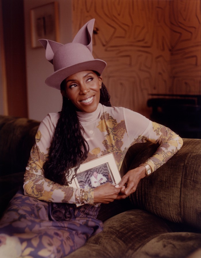 Ambrose holds a photo of her mother