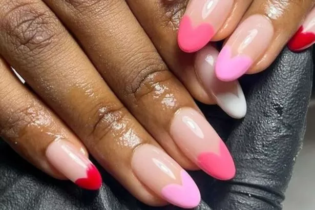If you like a French tip, try out these pastel heart tips instead