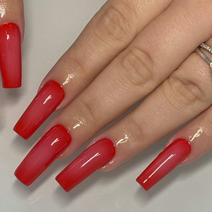 Vibrant red aura nail art matches the mob wife aesthetic.