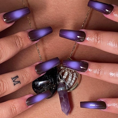 Purple aura art manicures are on-trend.