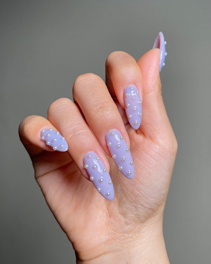 Lavender nails with pearls are on-trend.