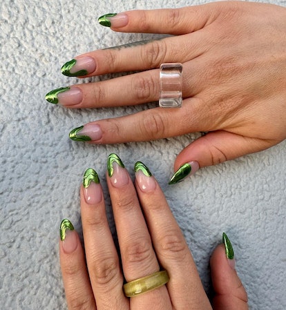 Turf-inspired green chrome French nails are on-trend for the 2024 Super Bowl.