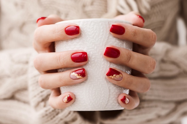 Red and gold nail art, which would be perfect to wear as Super Bowl nails this year.