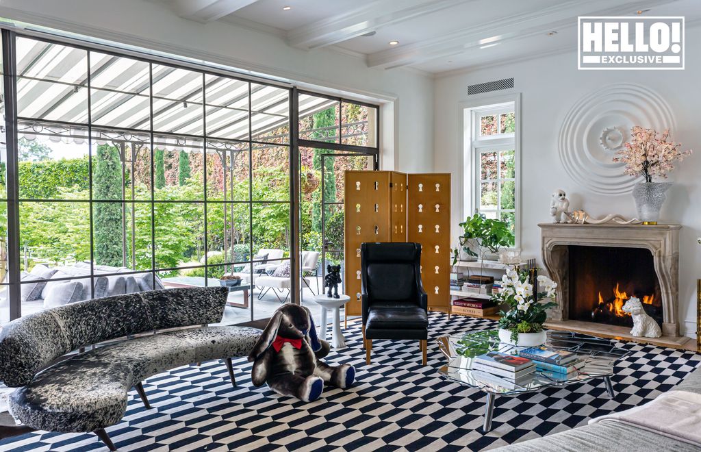 Tyler Ellis amazing home with marble fireplace and floor to ceiling French doors