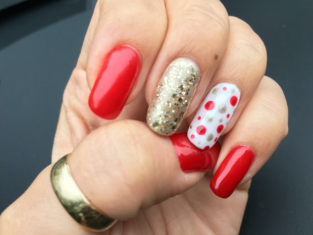 Red and gold nail art, the perfect Super Bowl nails for 2024.