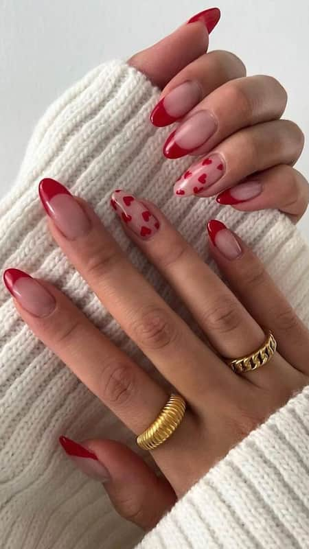 Crimson Love Cascade: Classic red nails with a cascading heart design create a striking statement of love and passion.