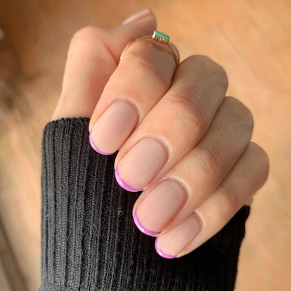 Purple micro French tip nails are on-trend.