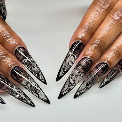 Black lace nail art matches the 