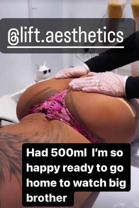 A clinician grips her bum during the procedure