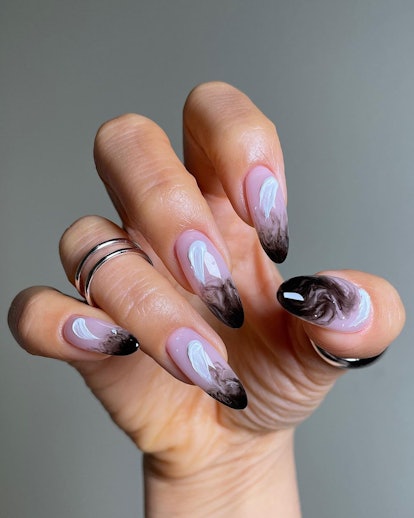 Abstract black smoke nail designs match the 