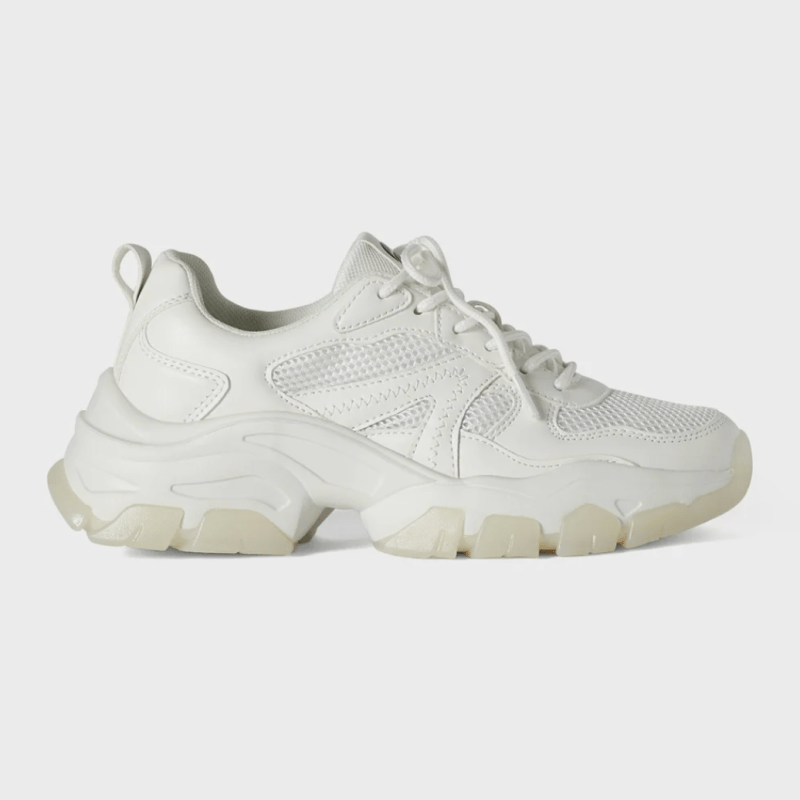 A chunky white running shoes with thick soles and mesh panels