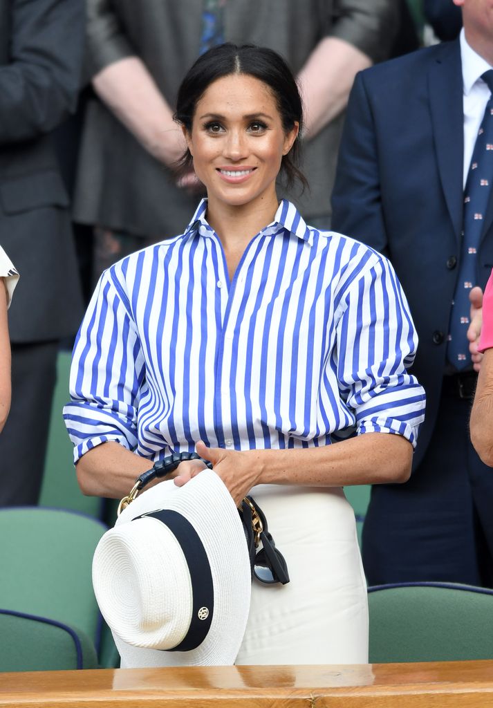 Meghan, Duchess of Sussex  attends day twelve of the Wimbledon Tennis Championships at the All England Lawn Tennis and Croquet Club on July 14, 2018 in London, England.  (Photo by Karwai Tang/WireImage )