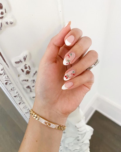 Cherry nail art designs are trending for summer 2024.