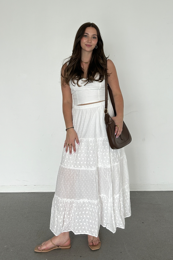 a woman in a white dress