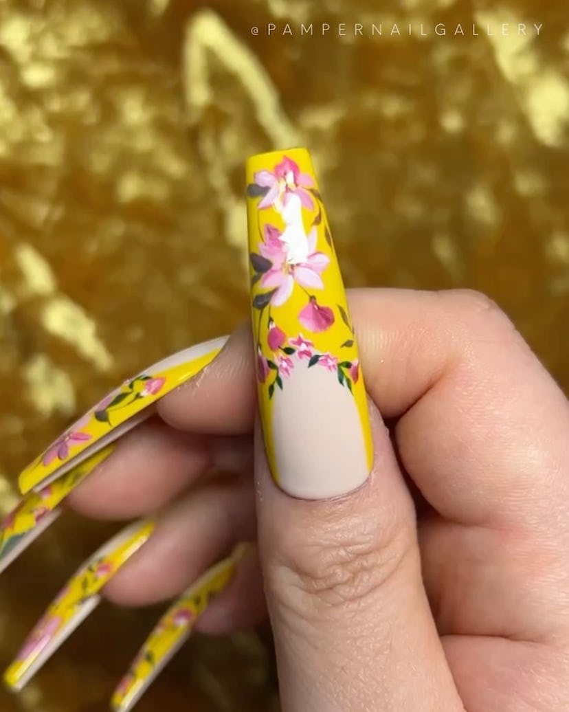 These yellow and pink floral French tip nails are inspired by 'Bridgerton.'