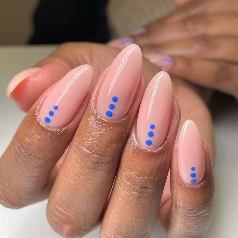 Minimal electric blue dot designs are perfect for Gemini season 2024.