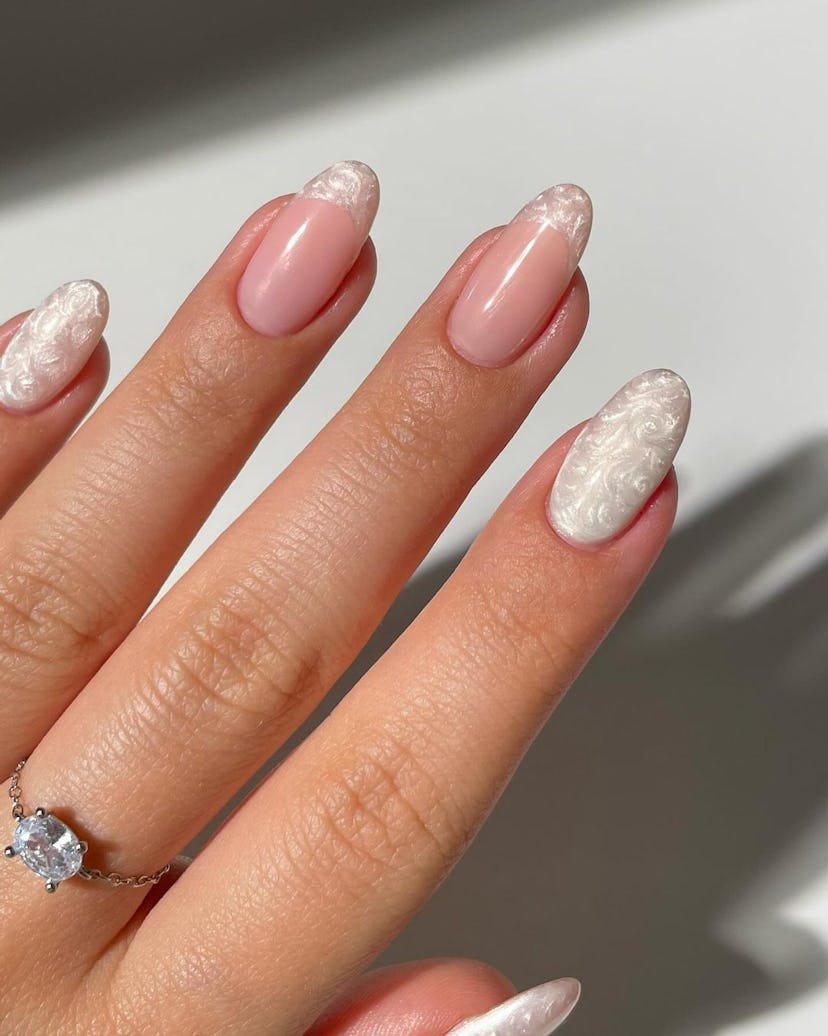 Pearl-inspired nails are perfect for Gemini season 2024.