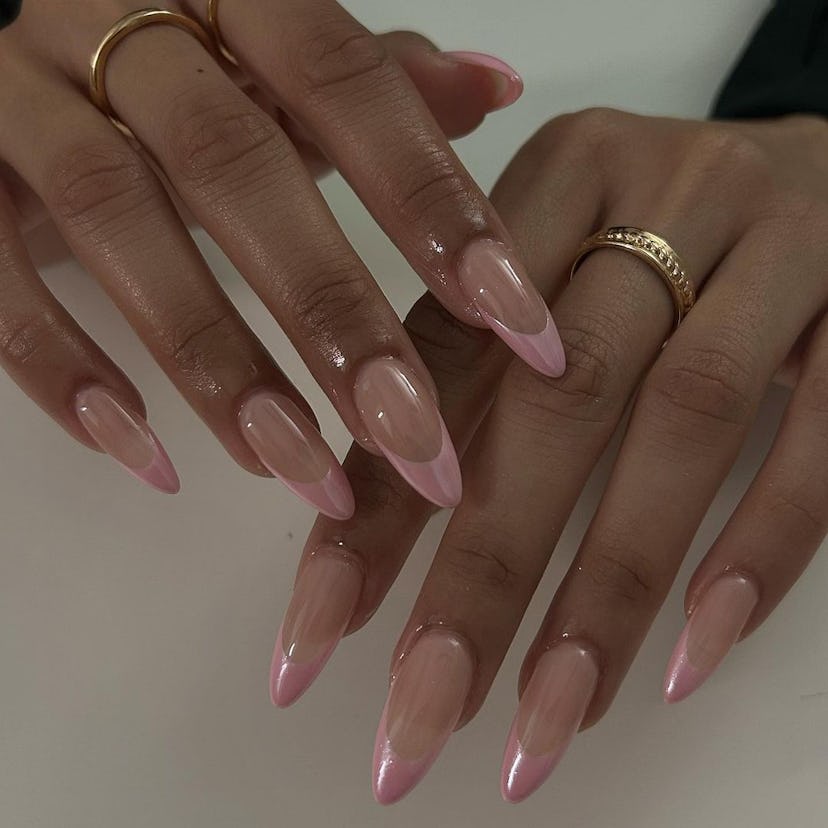 Try almond-shaped pastel pink French tip nails with a glazed donut finish.