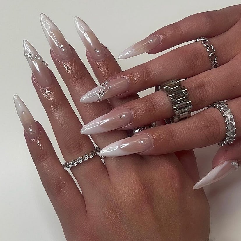 Soft chrome French tips are perfect for Gemini season 2024.