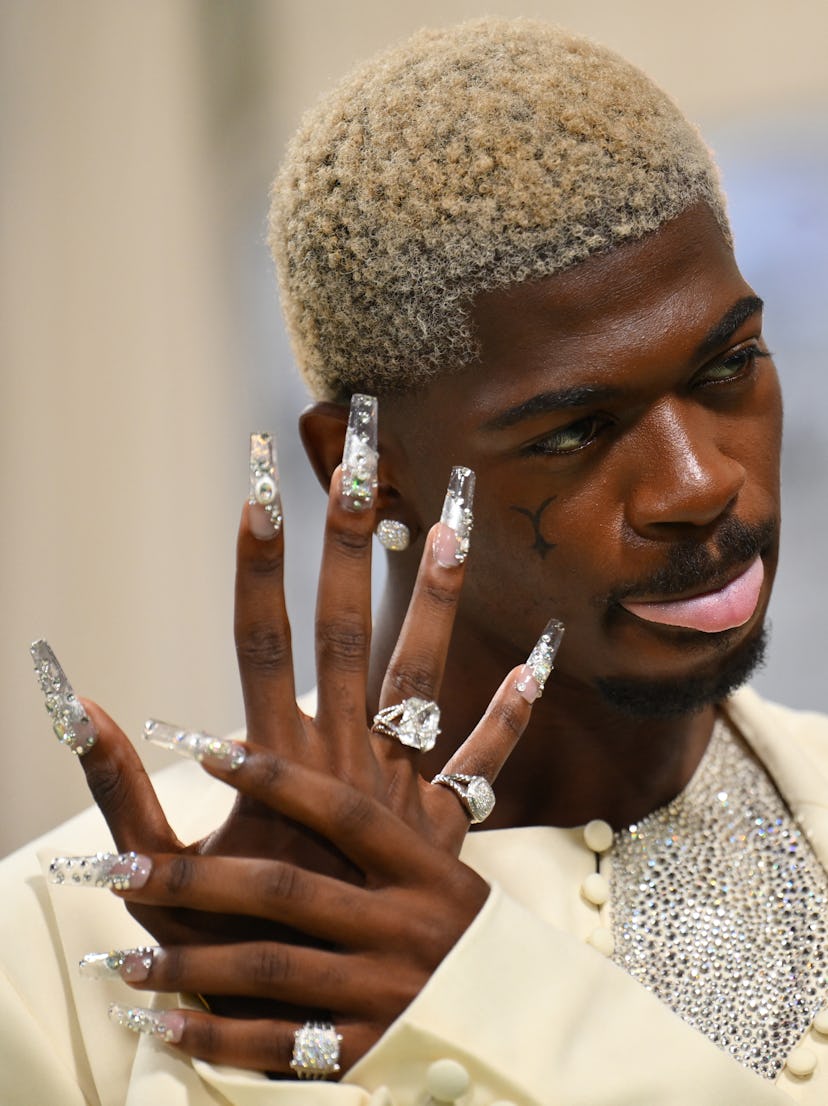 Lil Nas X wore XXL crystal nails to the 2024 Met Gala.