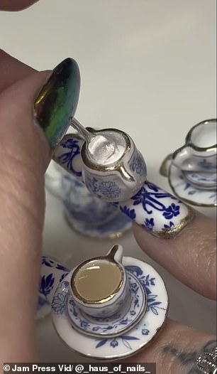 In the video, Morgan can be seen carefully pouring British people's favorite beverage into a miniature cup secured to her index finger