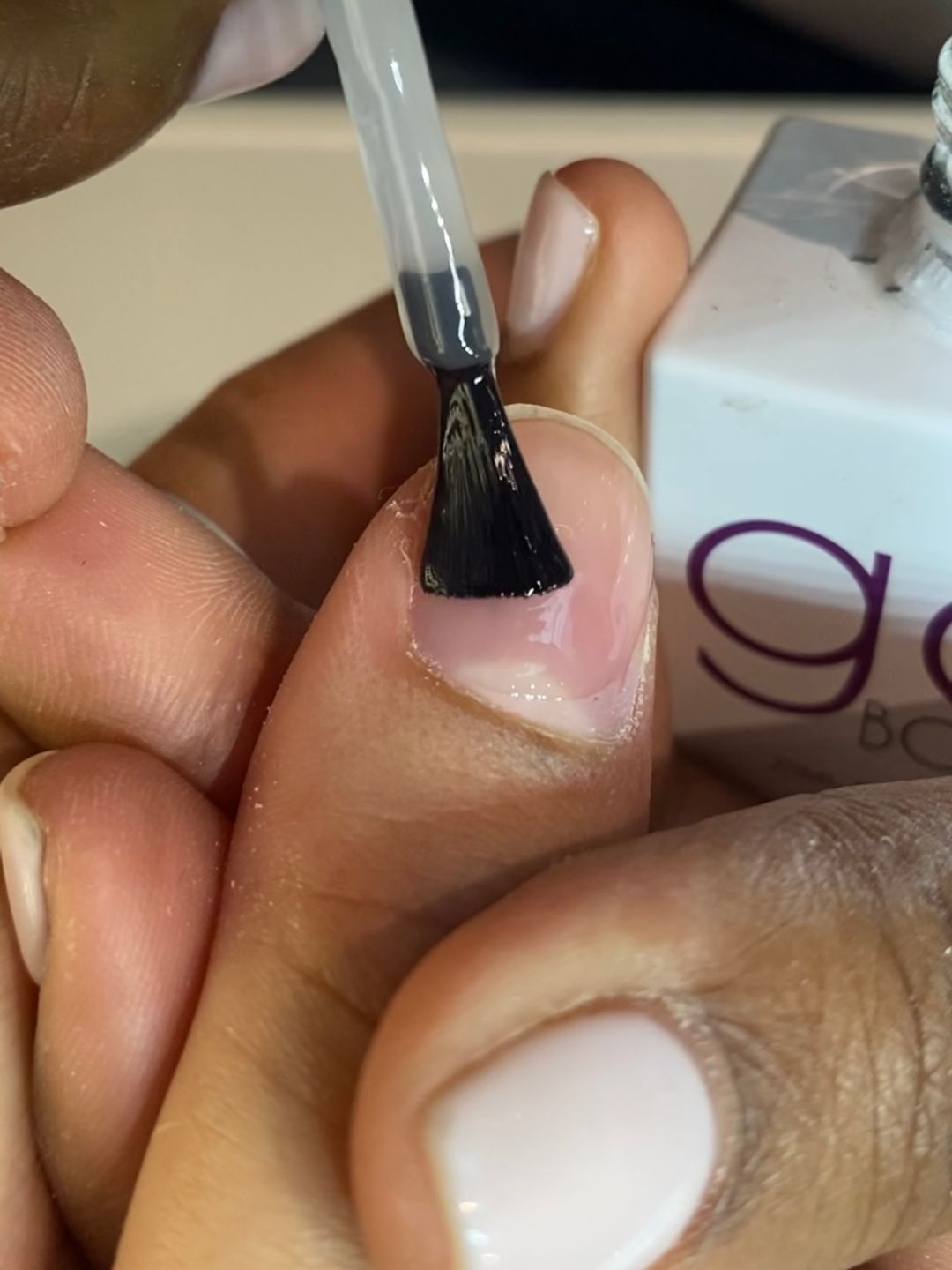 BIAB being applied onto the nail