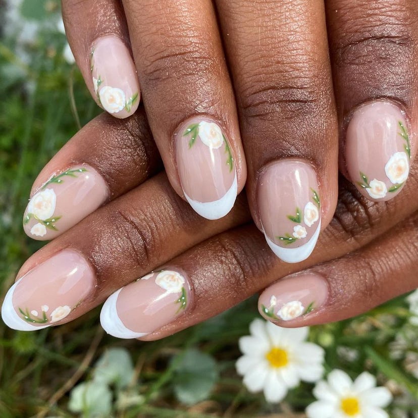 White rose nail art is perfect for Cancer season 2024.