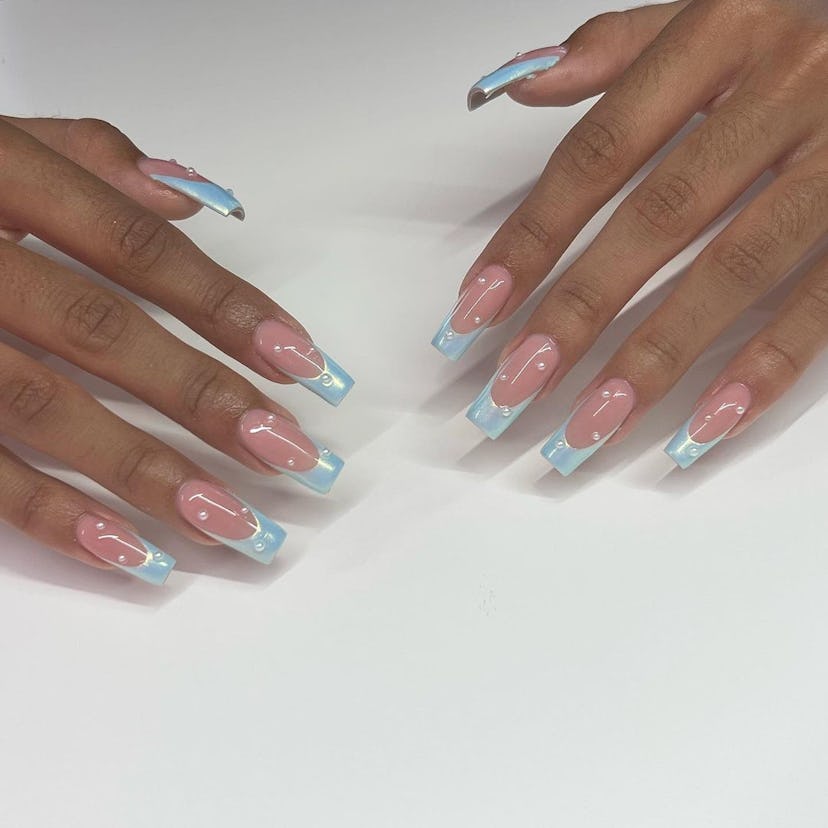 Blue chrome French tips with pearls all over are perfect for Cancer season 2024.