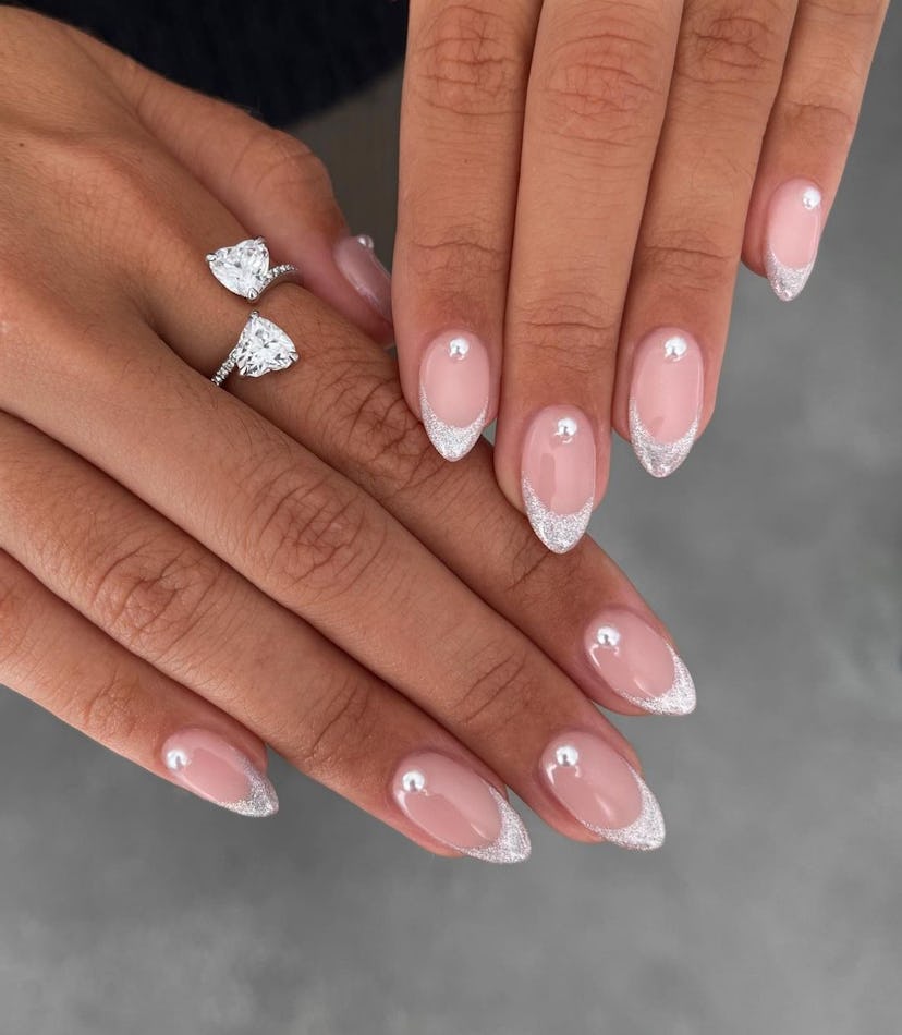 Glittering French nails with rhinestones are perfect for a Libra on their wedding day.