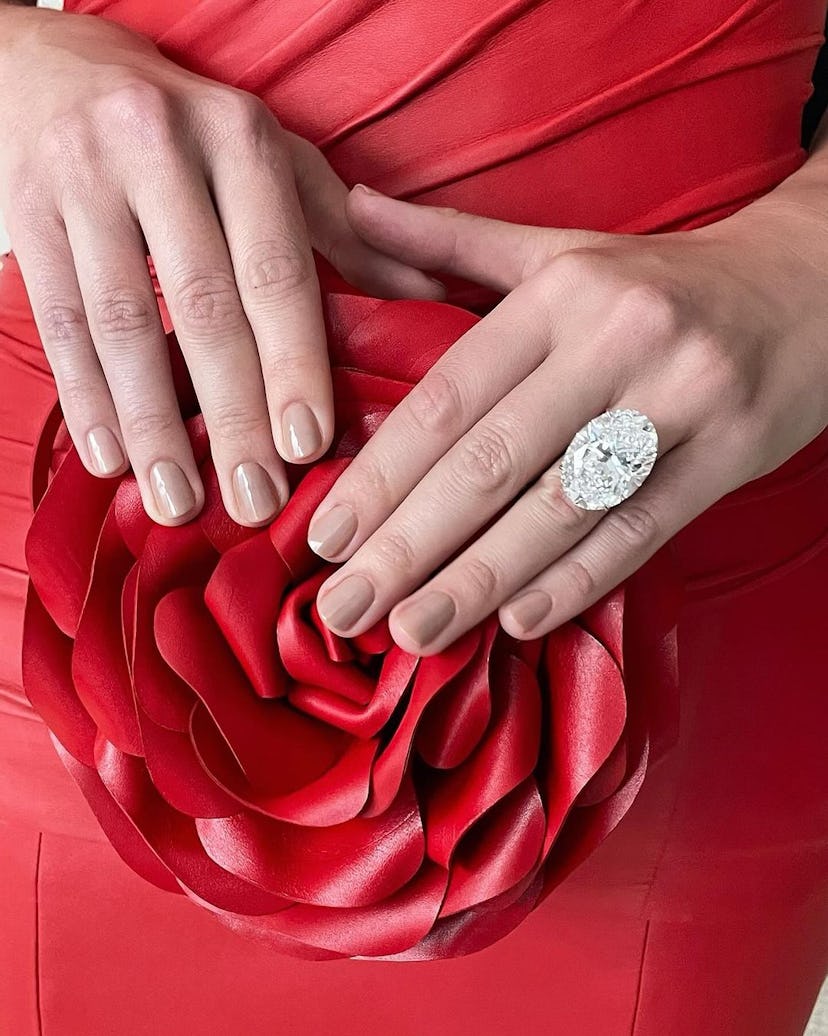 Tonal mannequin nails are perfect for a Capricorn on their wedding day.