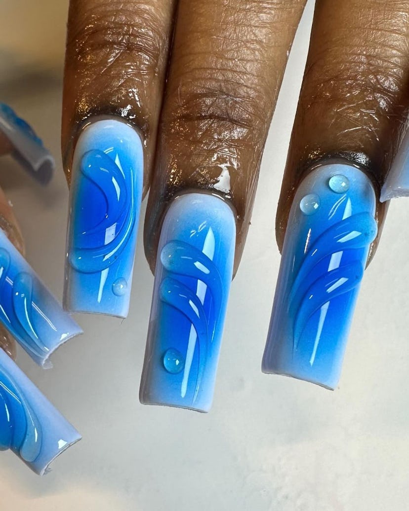 Blue aura nails with 3D dew drops are perfect for Cancer season 2024.