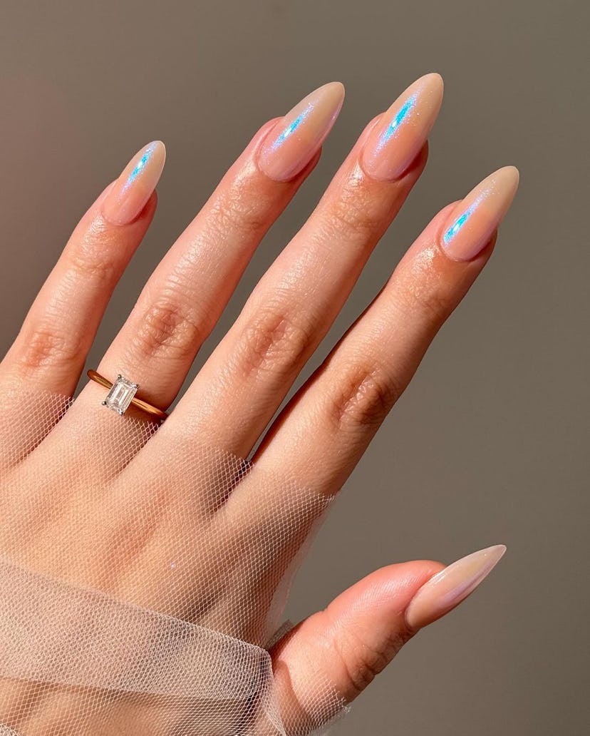 Mannequin nails with a holographic finish are perfect for Cancer season 2024.