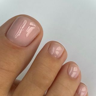 Sheer pink pedicure colour