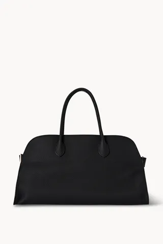 black leather tote bag with a top handle by The Row