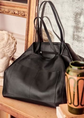 black tote bag with a top handle