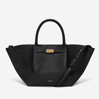 black tote bag with a top handle and gold hardware