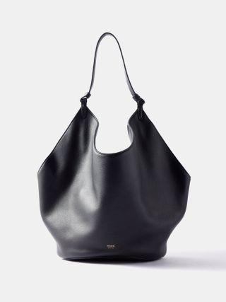 black tote bag with a top handle by Khaite