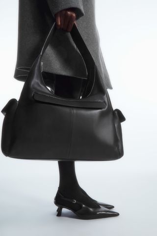 black tote bag with a top handle