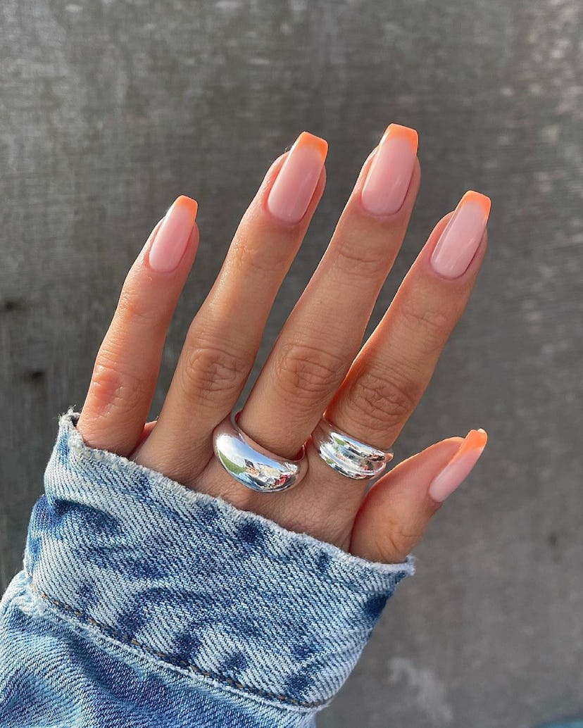 Try peach French tip nails for summer 2024.