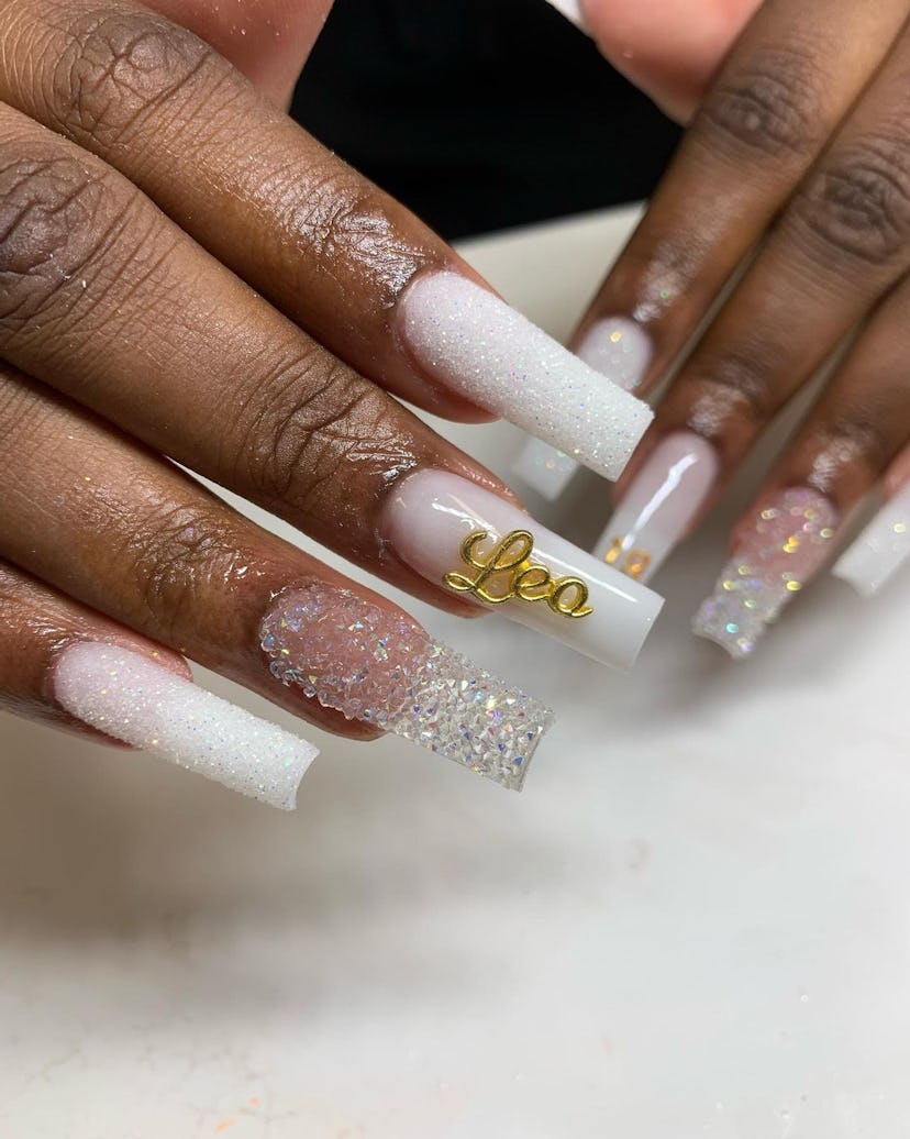 Leo zodiac nameplate on nails are perfect for Leo season 2024.